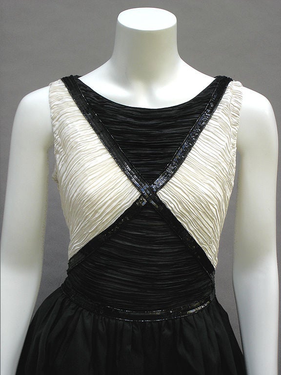 Black and white bubble-skirt cocktail dress by Mary McFadden Couture ... Very Gossip Girl -- Park Avenue Princess ... Chic X design in black sequins on the bodice ... There's just something perfectly stylish about the stark elegance of black and