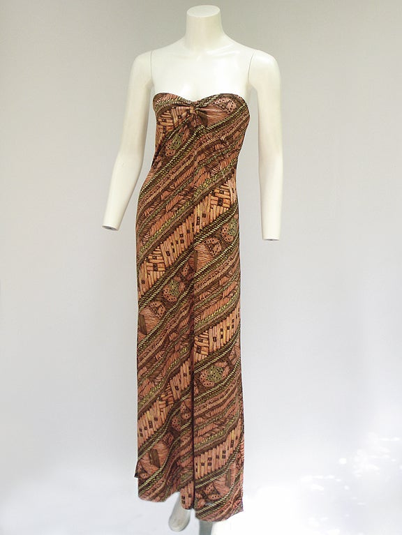 The best print ever! A tribal, South Seas-inspired beauty. The fabric is a gorgeous nylon jersey, soft and liquid. The colors are cocoa brown, espresso, mango, moss, and olive. The dress is all unlined, and has a back zipper. Extra-maxi length, to