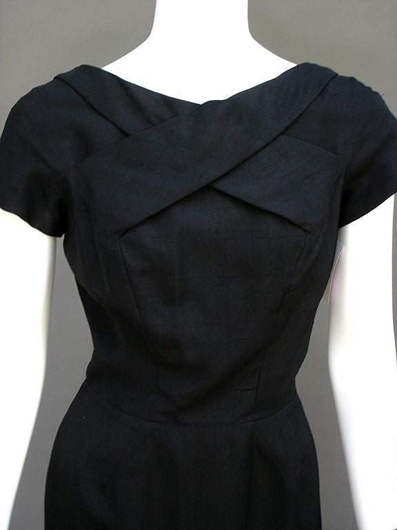 When looking like the perfect lady is the only option, Luis Estevez  never gets it wrong ... Raw noir silk ... Outstanding attention to design detail, as with all of his garments ... We LOVE the X design in overlaid bands of fabric crossing above