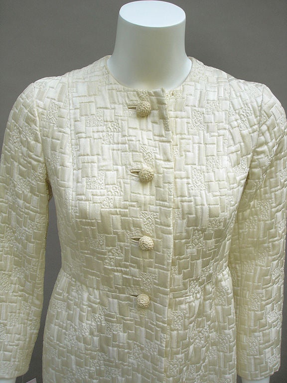 Brilliant 60s COAT That Has That Uber Rare Quality Of Lady Like And Babydoll.<br />
<br />
Absolutely Amazing ' TOP QUALITY ' Satin Brocade Fabric ( We Think This Is Silk -Satin -) - with THE MOST Amazing Pattern Sewn On Top -' L ' Shaped