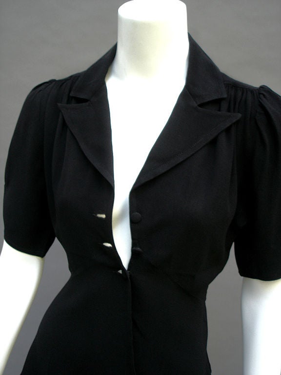 Stunning Ossie Clark black moss crepe top  with fab 40s styling ... We love to rock an Ossie top with jeans; his tailoring is exquisite! There is nothing like an Ossie Clark piece for coolest-girl-in the-room chicness ... Everything that he designed