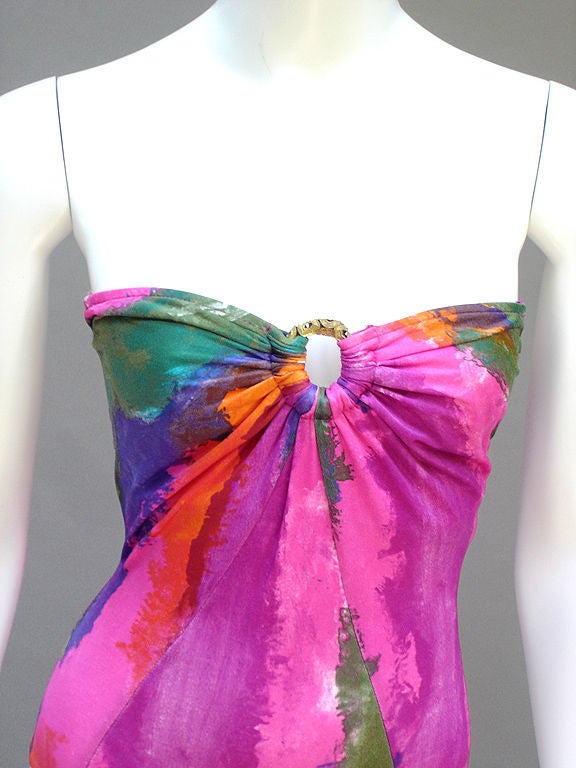 A Gorgeous Maillot By Design Star Oscar de la Renta . . . Painted Strokes In Luscious Magenta, Hot Pink, Cherry, Grape, Fiery Orange, And Olive Green . . . A Simple Halter Strap Fastens At The Front With Two Lingerie Hooks . . . The Bodice As A
