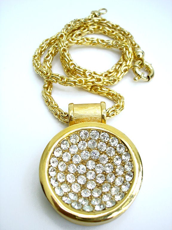 The Most Gorgeous- HUGE and Heavy Lanvin Pendant . . . Simply Shimmering With Hugh Rhinestones In A Concave Circular Design . . . Super Quality Intricately Woven - heavy-Chain . . . Uber-Quality Clasp . . . Signed On Back LANVIN PARIS. . .
a couple