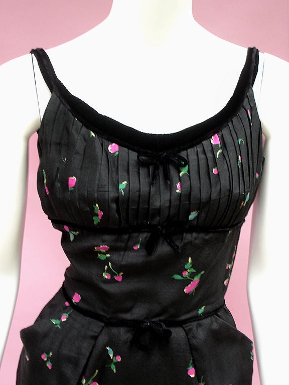 Marilyn Was Known To Adore Ceil Chapman Designs, And This Dress Leaves No Doubt As To Why! A sexy classic that kisses every curve and looks like a million bucks!<br />
<br />
Black Silk Fabric With Touches Of Color In The Petite Blooms -- Fuchsia,