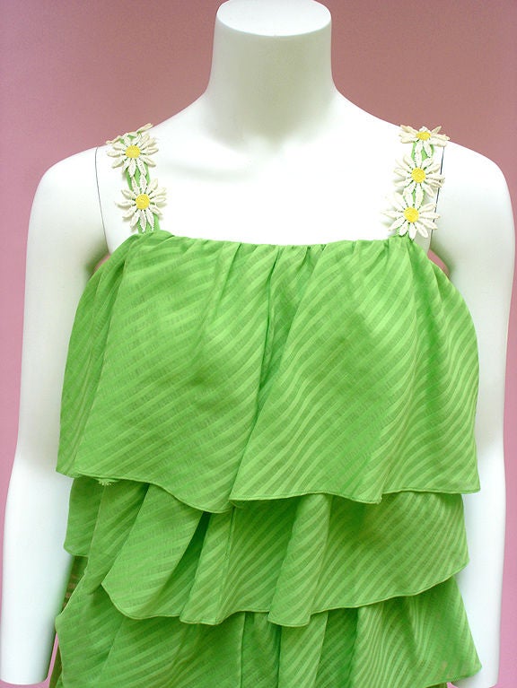 Candy, candy, candy I won't let you go . . . Lime green voile mini in tone-on-tone candy stripes . . . Let your inner girly-girl out to cavort!<br />
<br />
We're really impressed by how modern some vintage dresses feel. This little one could have