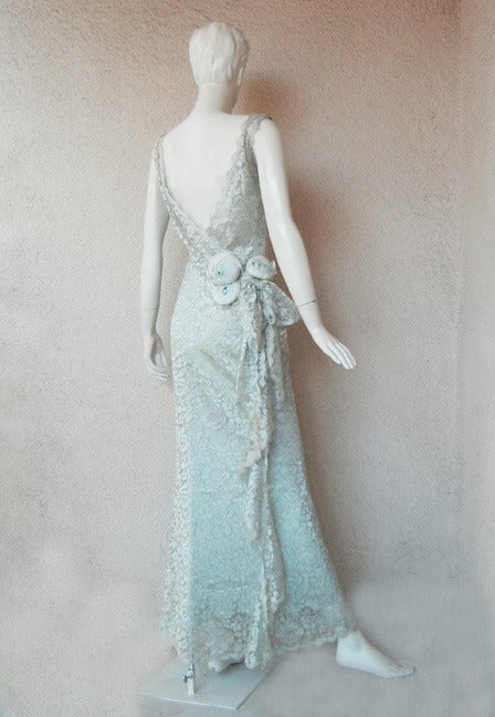 Circa 1998 Christian Dior by John Galliano. Exquisitely elegant bashful blue chantilly lace creation influenced by the 30's Gatsby era.

Cut and tailored with Galliano's meticulously designed earlier work the dress boasts the flair and  inspiration