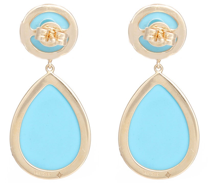 These beautiful teardrop shaped dangle earrings measure apx. 1-1/4 inches in length and 1/2-inch at the widest point on the teardrop. Set in 14k yellow gold they have apx. .50 cts. Diamonds. Turquoise is very popular and these earrings are really