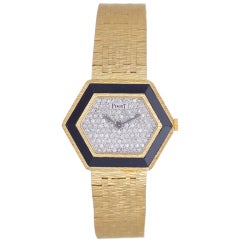 PIAGET Lady's Yellow Gold, Diamond and Onyx Bracelet Watch