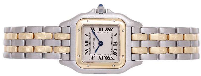 Cartier Panthere lady's two-tone wristwatch, Ref. W25029B6, with quartz movement. Stainless steel case with 18k yellow gold bezel (21mm x 30mm). Ivory-colored dial with black Roman numerals. Stainless steel and 18k yellow gold Panthere bracelet.
