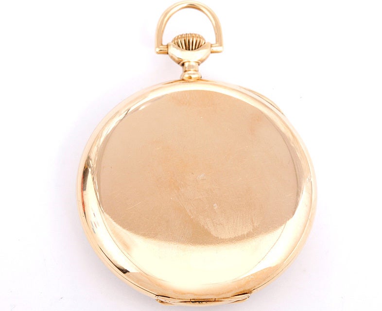 E. Howard Co. of Boston 14k yellow gold pocket watch, 23 Jewels manual-wind movement. Case size 12. White enamel dial with black Roman numerals; subsidiary seconds at 6 o'clock. Pre-owned.
