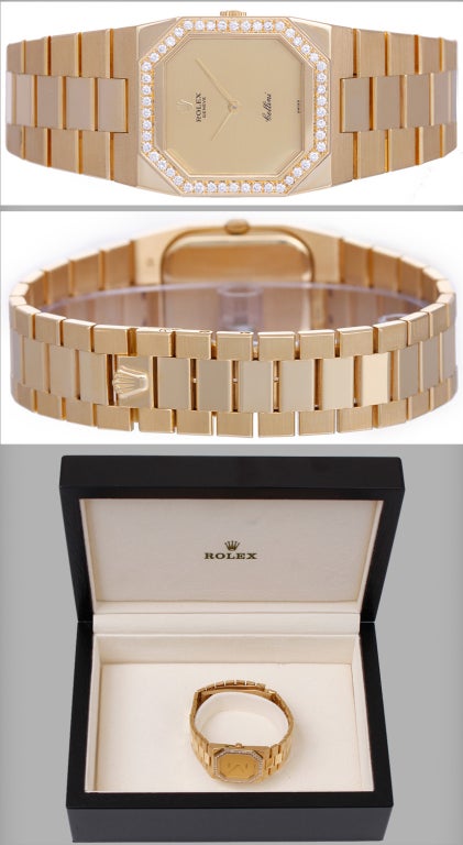 Rolex Cellini 18k yellow gold bracelet watch with diamond bezel, Ref. 4650, with quartz movement. 18k yellow gold case with octagonal diamond bezel, 27mm x 34mm, gilt dial,18k yellow gold tapered bracelet with polished center links, will fit apx.