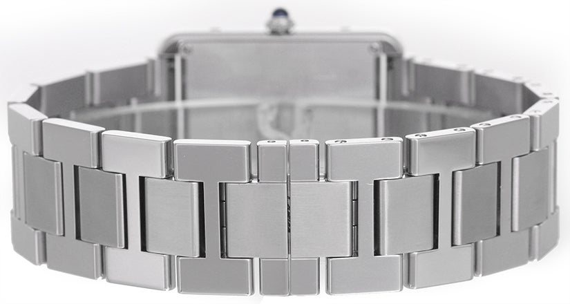Large Cartier stainless steel Tank Solo wristwatch, Ref. W5200014, with quartz movement. Stainless steel case (27mm x 35mm). Silvered dial with black Roman numerals. Stainless steel bracelet (will fit apx. 7-1/4-inch wrist). Pre-owned with custom