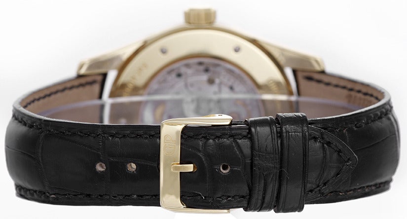 Girard Perregaux 18k yellow gold Classic Elegance Moonphase wristwatch, Ref. 49530-0-51-1112, with automatic movement, date and moonphase. 18k yellow gold case (40mm diameter). Silvered dial with gold markers, date, subseconds and moon phase. Strap