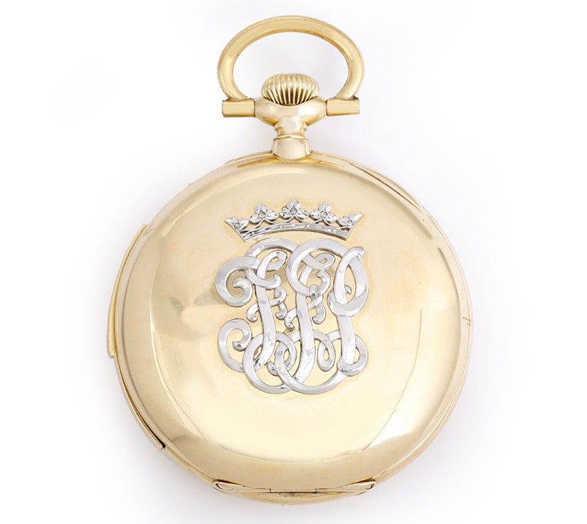 Patek Philippe rare and collectible 18k yellow gold minute repeater pocket watch, retailed by Tiffany & Co., with manual-wind movement. 18k yellow gold case with platinum monogram with crown on back (50mm diameter). White enamel dial with black