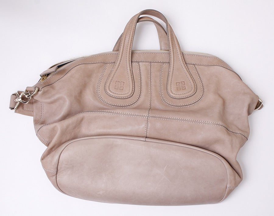 In excellent condition, this Putty Leather Nightingale Satchel from Givenchy is a fantastic find I may have carried it once, if at all. The Nightingale is released each season in new colors and textures. This soft beige is the perfect year round