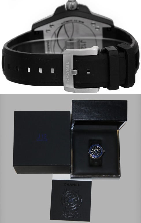 Chanel black ceramic J12 Marine wristwatch, Ref. H2561, with automatic movement and date. Black ceramic case, stainless steel bezel with blue bezel insert (38mm diameter). Black dial with luminous style markers. Black rubber strap with stainless