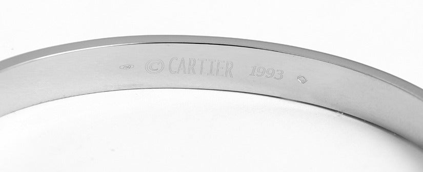Cartier Love Bracelet 18k White Gold Size 17 Box, Papers & Screwdriver. This beautiful bracelet is stamped CARTIER 1993, 17, 750  and l45473. This is a great piece for everyday as well as dress. Authenticity guaranteed. Like new condition with no