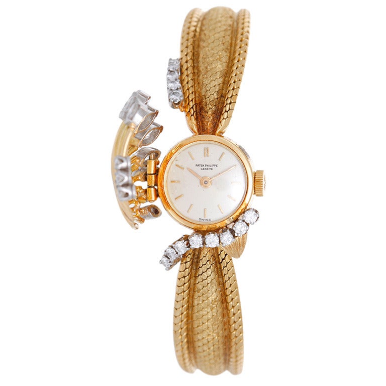 Patek Philippe Lady's Yellow Gold and Diamond Concealed Dial Bracelet Watch Ref 3266/49 circa 1960s