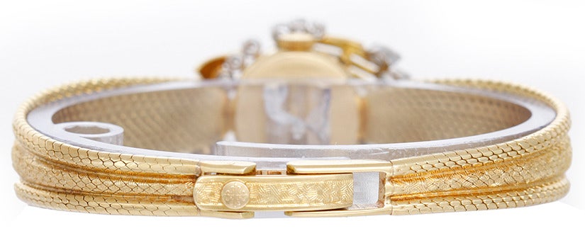 Women's Patek Philippe Lady's Yellow Gold and Diamond Concealed Dial Bracelet Watch Ref 3266/49 circa 1960s