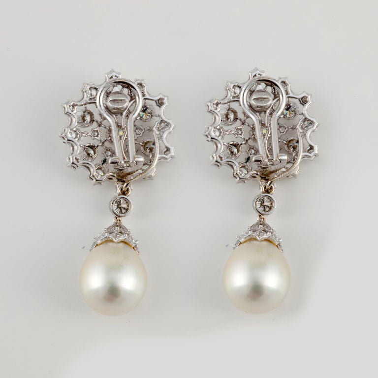 Buccellati 18 KT white gold and diamond earrings with detachable diamond and South Sea pearl drops.  Diamond total weight approximately 4.20 carats