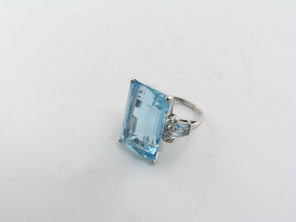 Women's A fabulous emerald cut aquamarine and diamond ring.