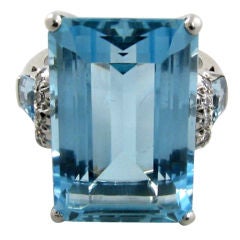 A fabulous emerald cut aquamarine and diamond ring.