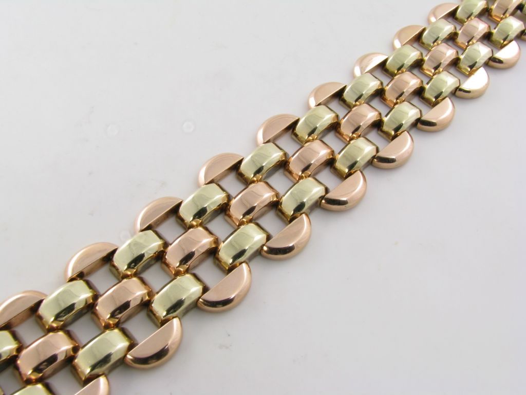 A fabulous rose and green gold link bracelet.