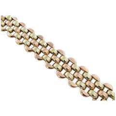 A fabulous rose and green gold link bracelet. A fabulous rose and green gold link bracelet.
