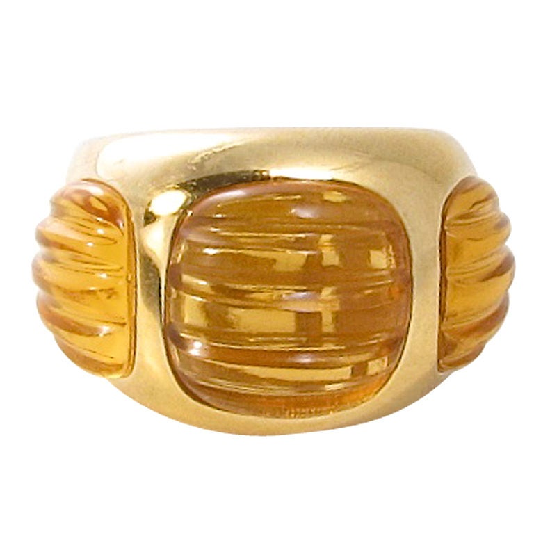 A bold fluted citrine and gold dome shaped ring.