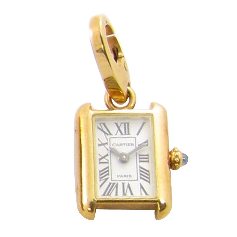 CARTIER charming yellow gold tank watch charm.