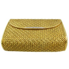 An exquisite woven gold and diamond minaudiere.