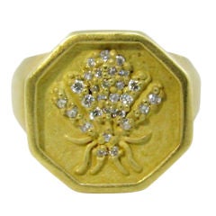 A Yellow Gold and Diamond Ring Set with a Bee Motif