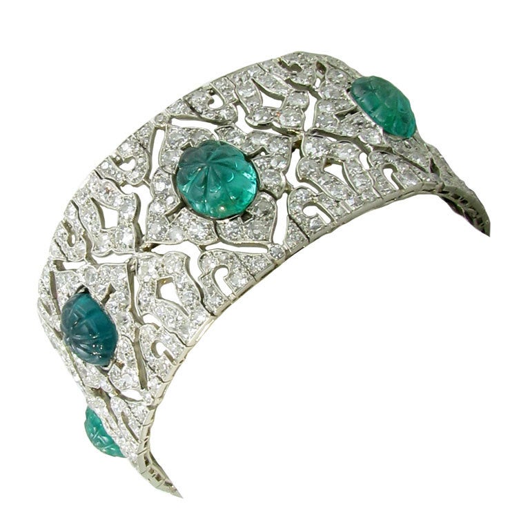 An Exquisite Carved Emerald, Diamond and Platinum Bracelet. at 1stdibs