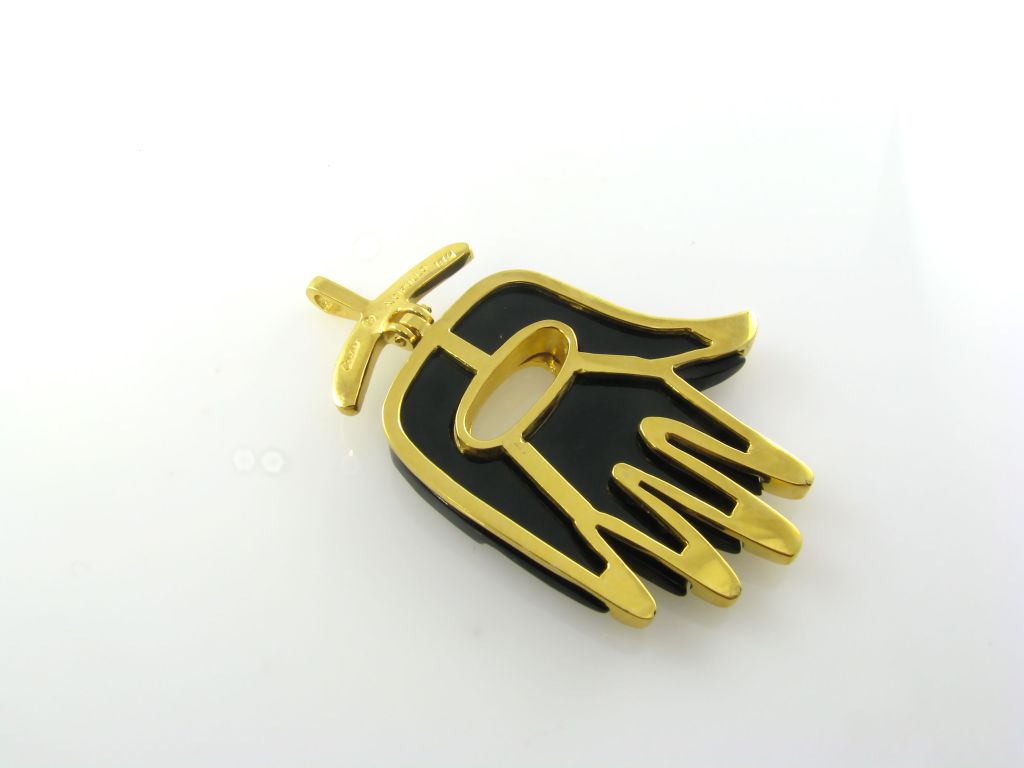 CARTIER:: ALDO CIPULLO Schwarzer Onyx und goldener Hamsa-Anhänger Damen