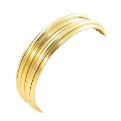 PIAGET Pair of Gold "Possession" Bangle Bracelets.