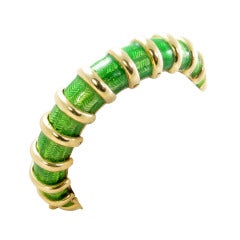 TIFFANY & CO., Green Enamel and Gold Flexible Bangle Bracelet.