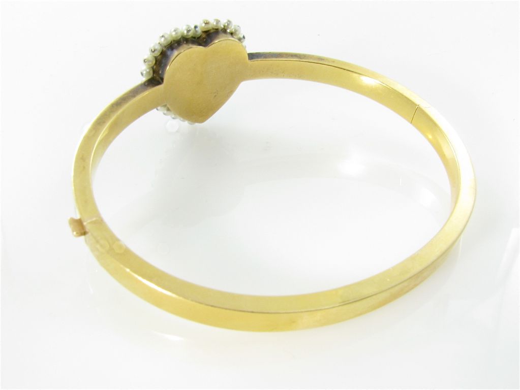 An Antique Yellow Gold, Enamel, Pearl, and Diamond Bracelet.