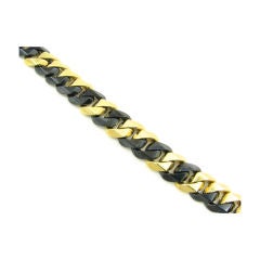 Bulgari yellow gold and gunmetal link bracelet.