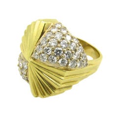 Pinwheel yellow gold and diamond ring.