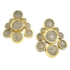 Marina B. yellow gold and silver coin earrings. Marina B. yellow gold and silver coin earrings.