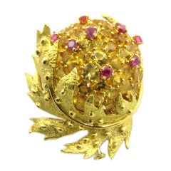 Schlumberger gold, yellow sapphire and ruby brooch