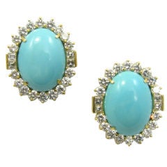 A gorgeous pair of turquoise and diamond earrings.