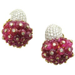 A sensational pair of diamond and ruby bead earrings.