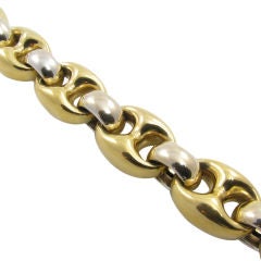 A stylish 18 karat yellow and white gold  link bracelet
