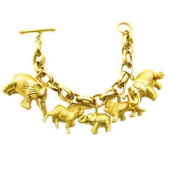 BIELKA chic gold  elephant, zebra and lion charm bracelet