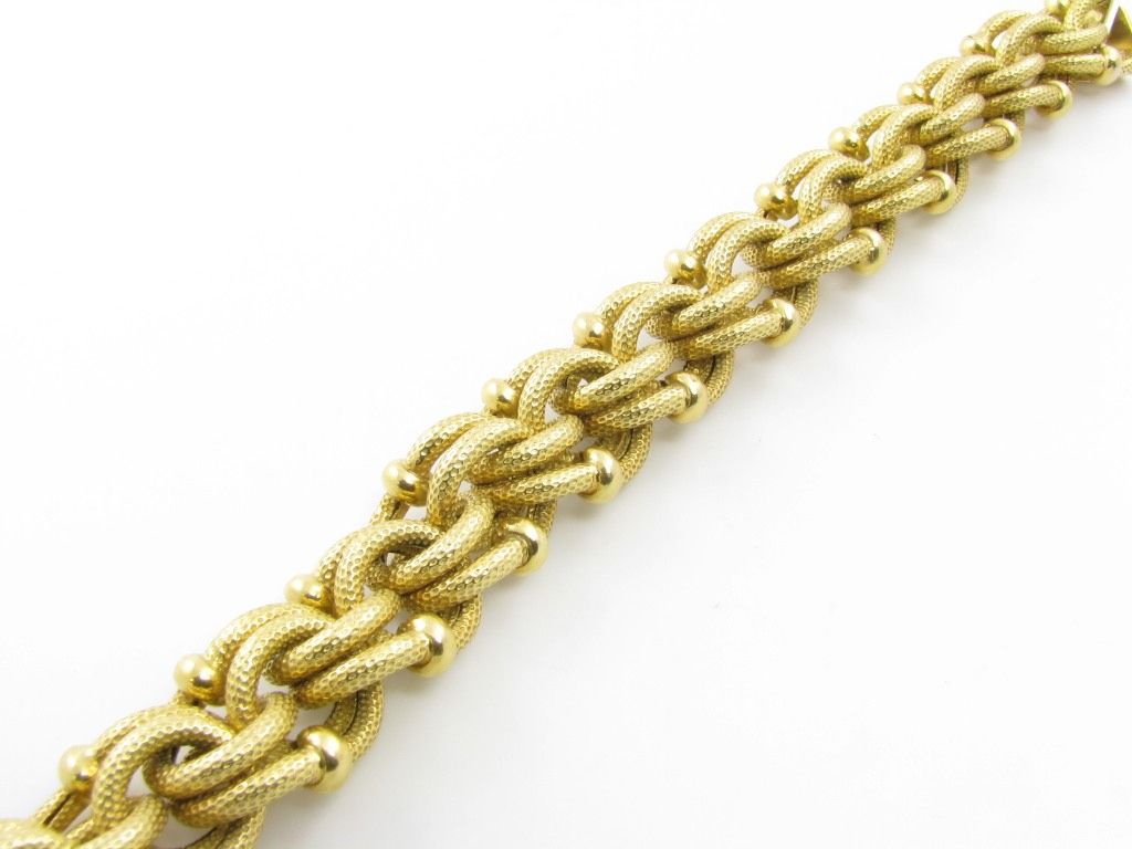 BULGARI fabulous 18 karat yellow gold textured link bracelet.