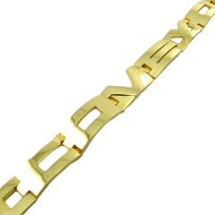 A. CIPULLO chic 18 karat yellow gold "I LOVE YOU" bracelet.