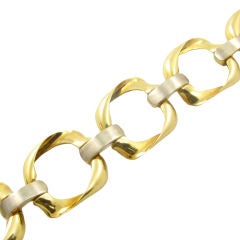 BULGARI chic 18 karat yellow and white gold link bracelet.