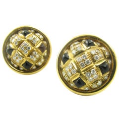 CHAUMET spectacular gold, black onyx and diamond earrings.