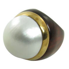 A chic mabe pearl, gold and tortoise shell  dome shaped  ring.